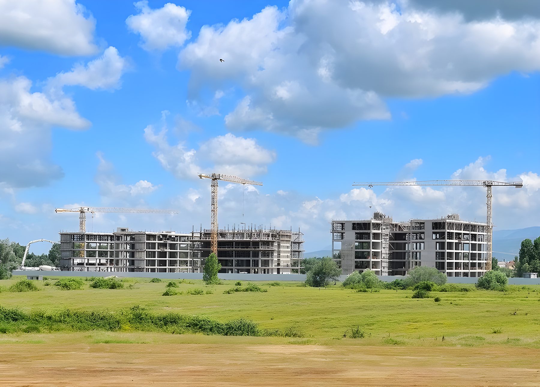 SIBA apartment buildings under construction with tower cranes
