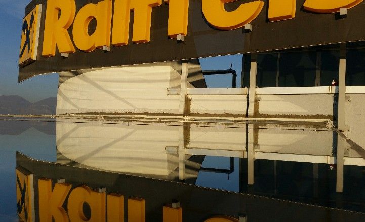 Raiffeisen branch — waterfront reflection